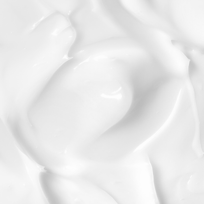 Thick, creamy substance with a smooth, flowing texture and subtle shine, showcasing its rich consistency.